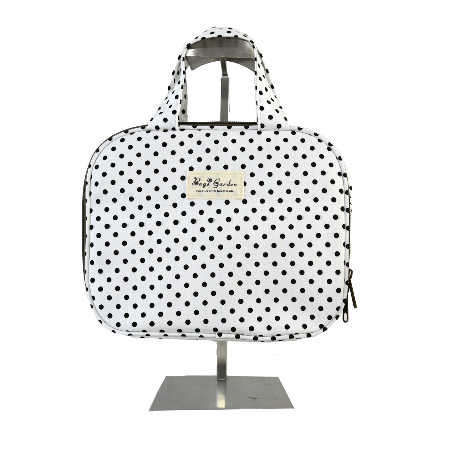 Hanging travel toiletry bag in polka dot cotton