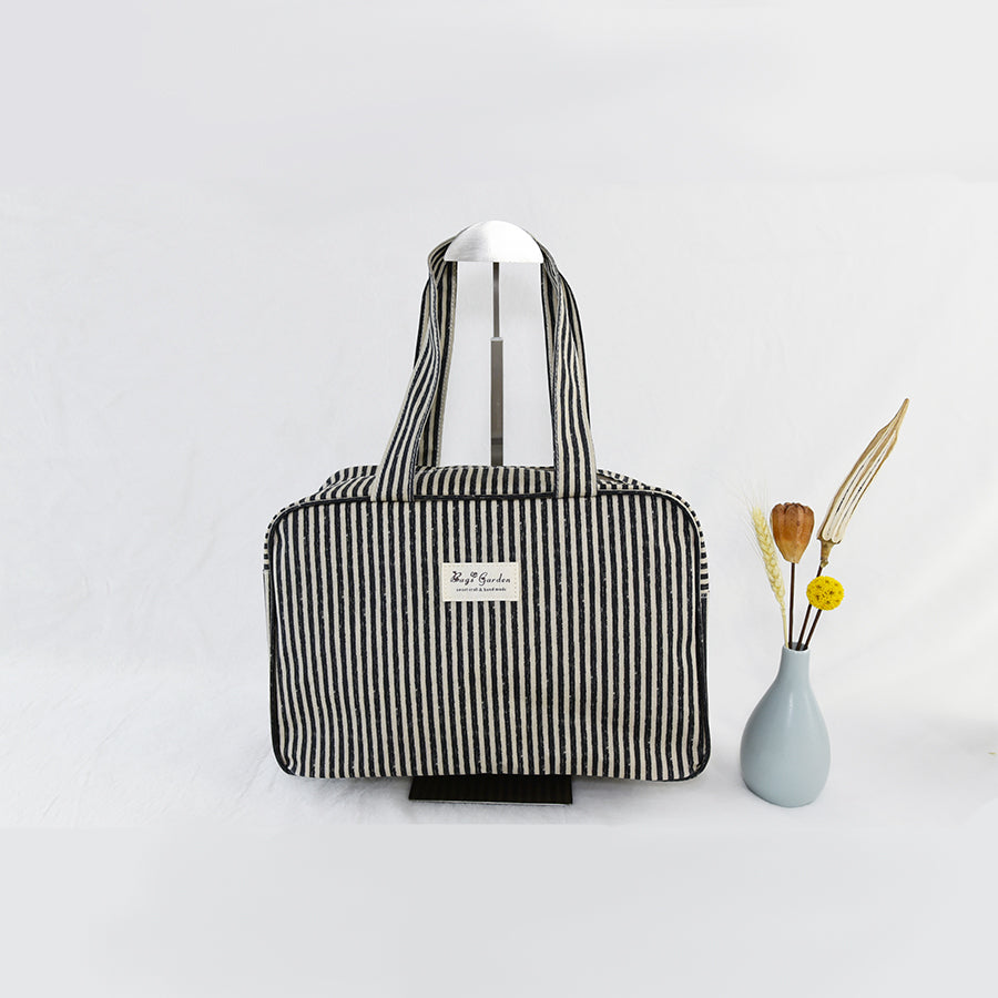 Bolso de mano impermeable de rayas