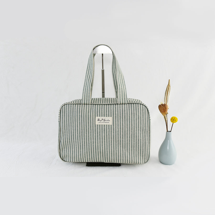 Bolso de mano impermeable de rayas