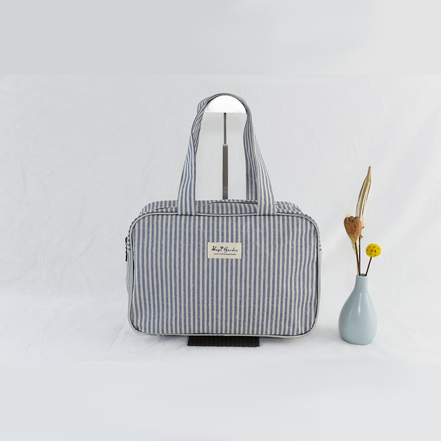 Bolso de mano impermeable de rayas