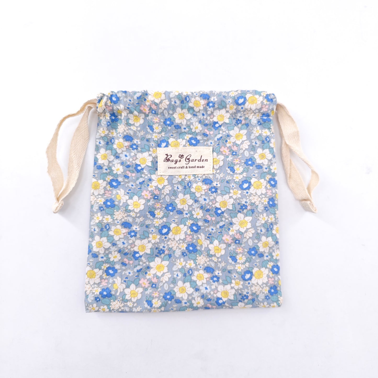 Small cotton bag with floral print and drawstring closure