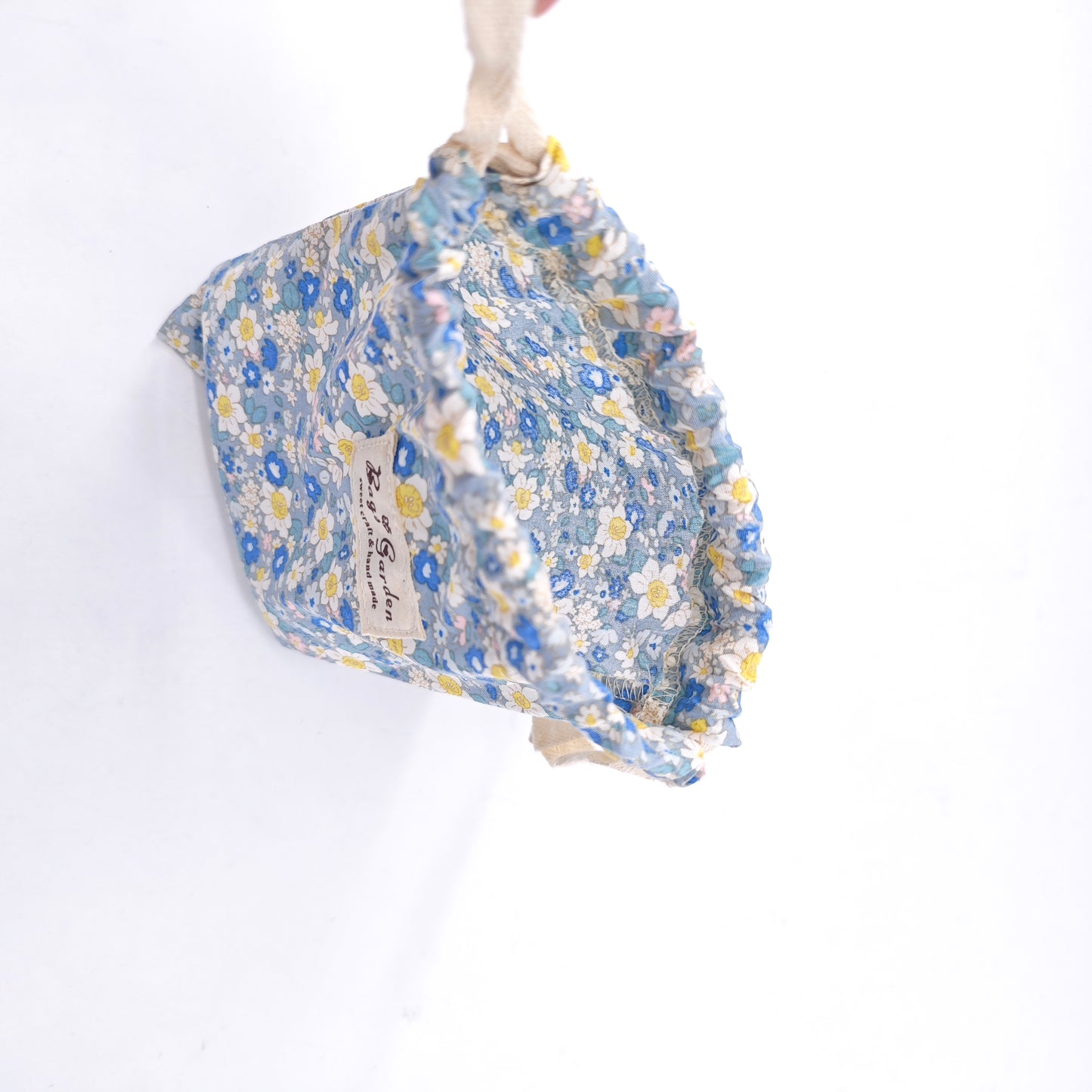 Small cotton bag with floral print and drawstring closure
