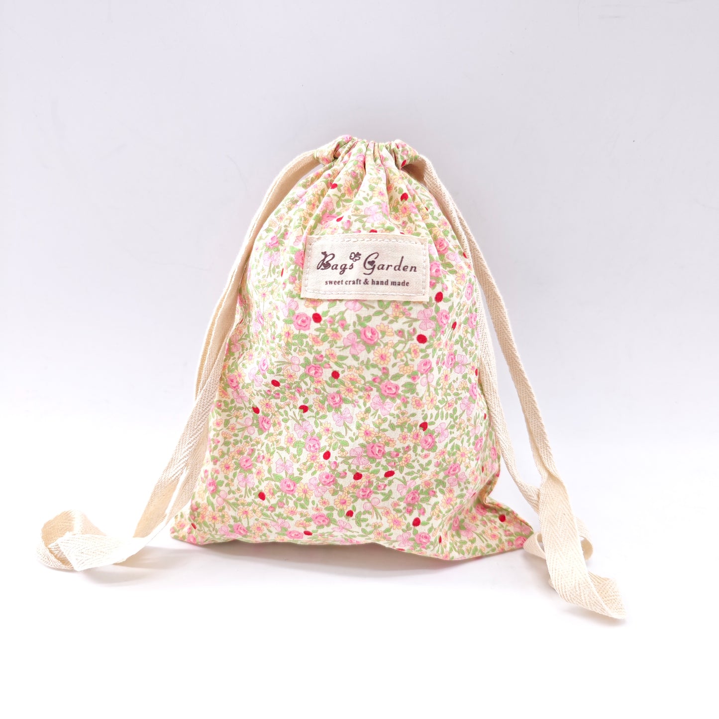 Large cotton bag with floral print and drawstring closure