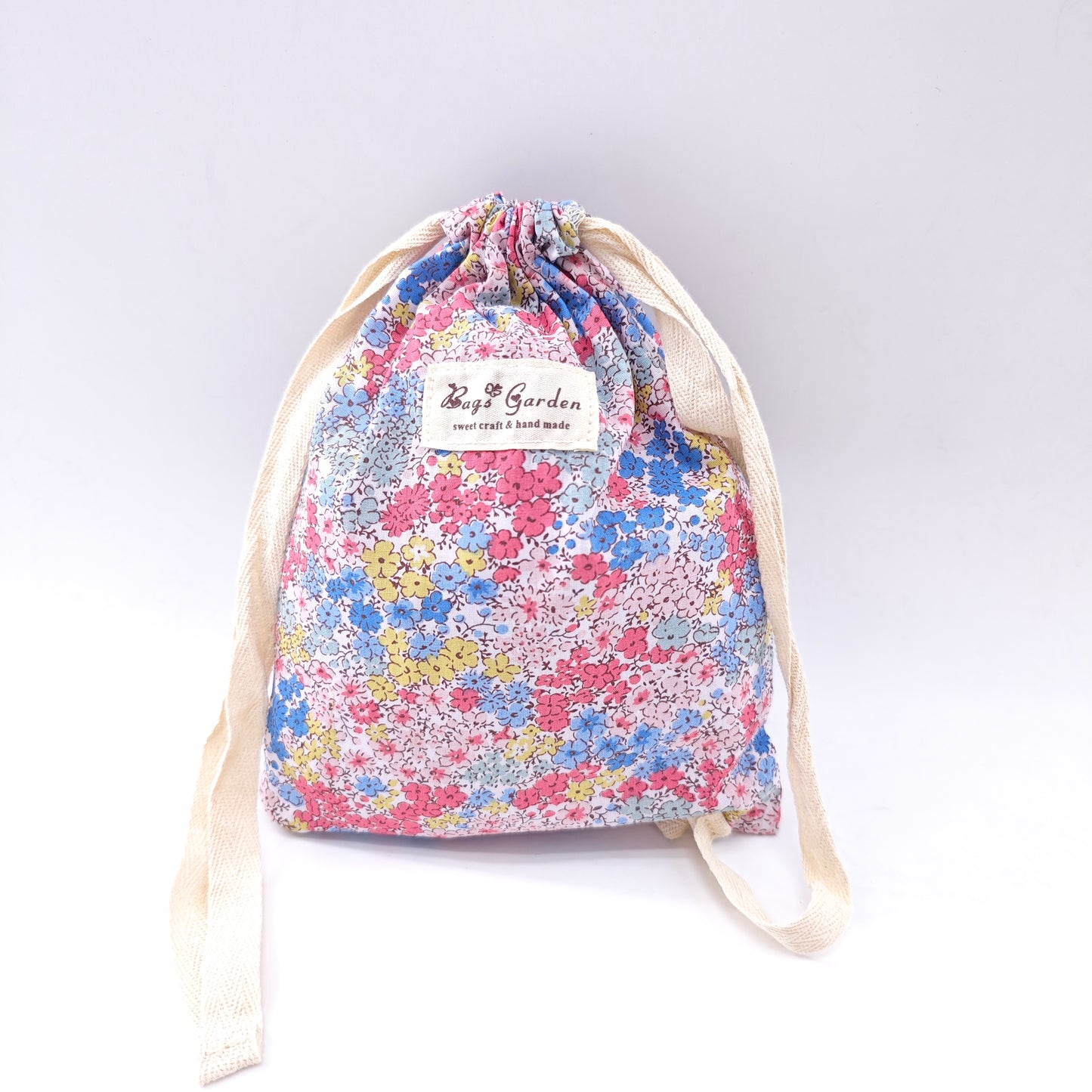 Large cotton bag with floral print and drawstring closure