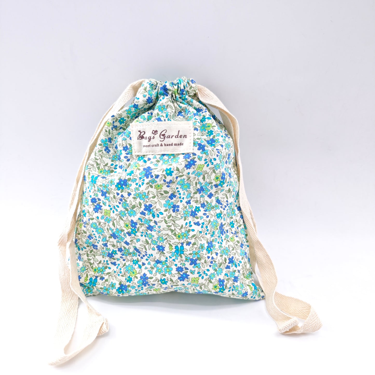 Large cotton bag with floral print and drawstring closure