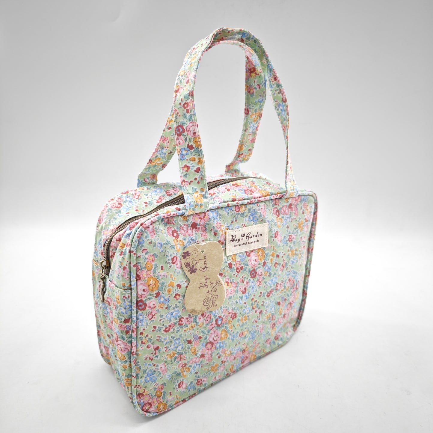 Bolso de mano impermeable con flores – formato cuadrado