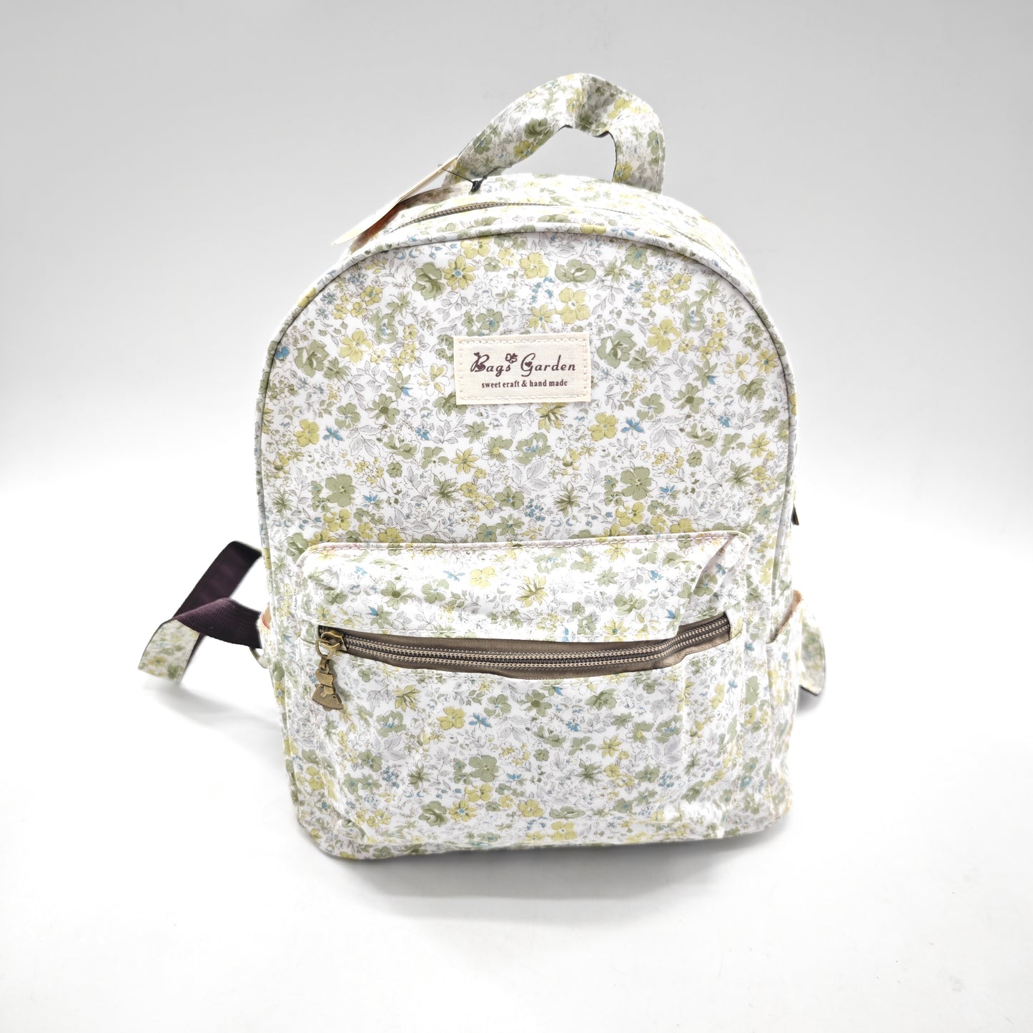 Mochila impermeable con flores – formato pequeño
