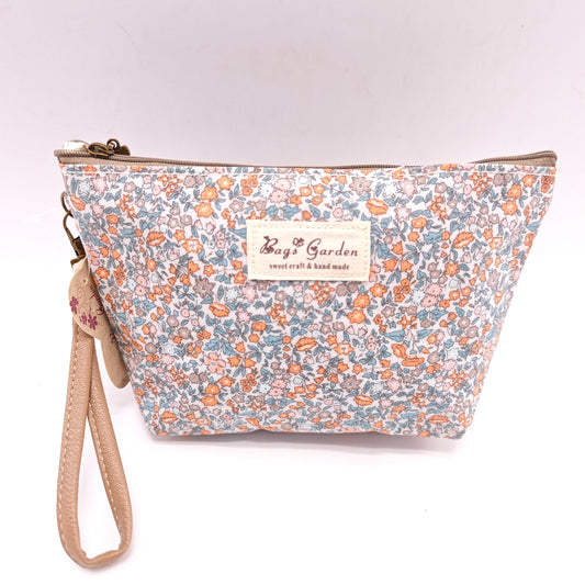 Neceser pequeño impermeable con flores