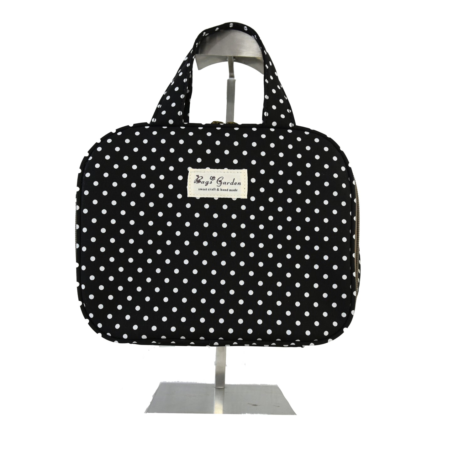 Hanging travel toiletry bag in polka dot cotton