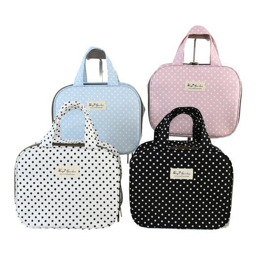 Hanging travel toiletry bag in polka dot cotton