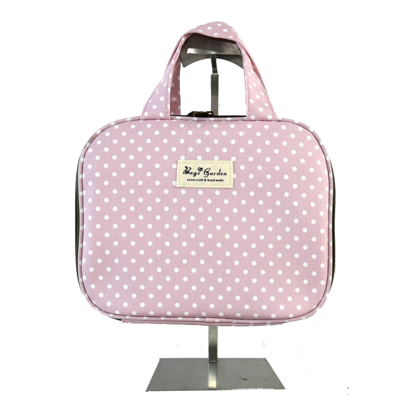 Hanging travel toiletry bag in polka dot cotton