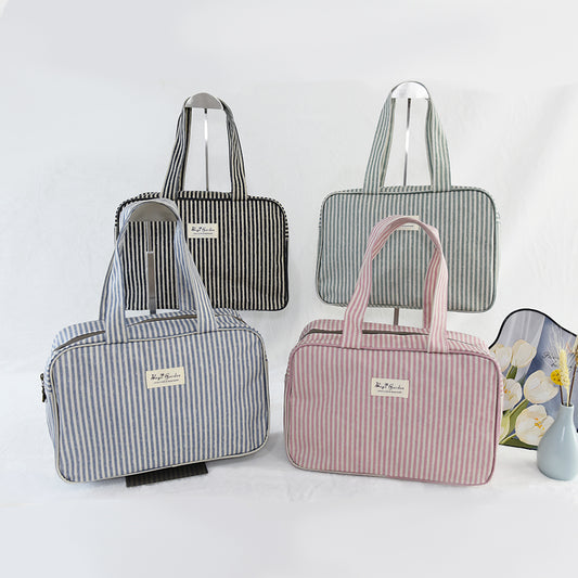 Bolso de mano impermeable de rayas