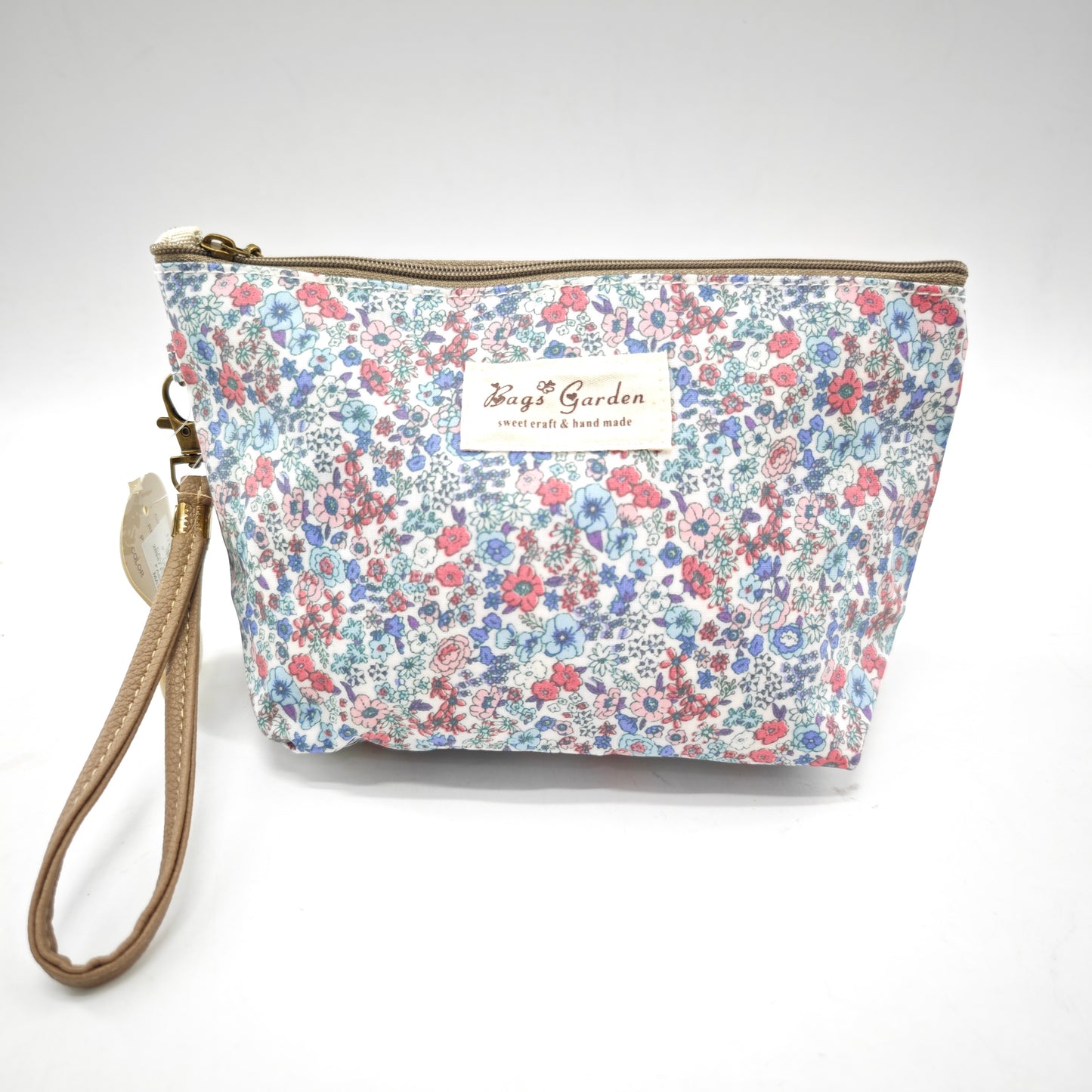 Neceser pequeño impermeable con flores