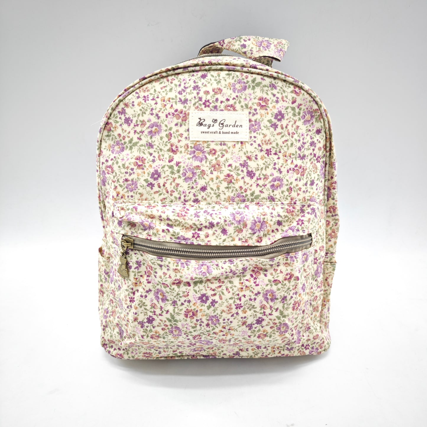 Mochila impermeable con flores – formato pequeño