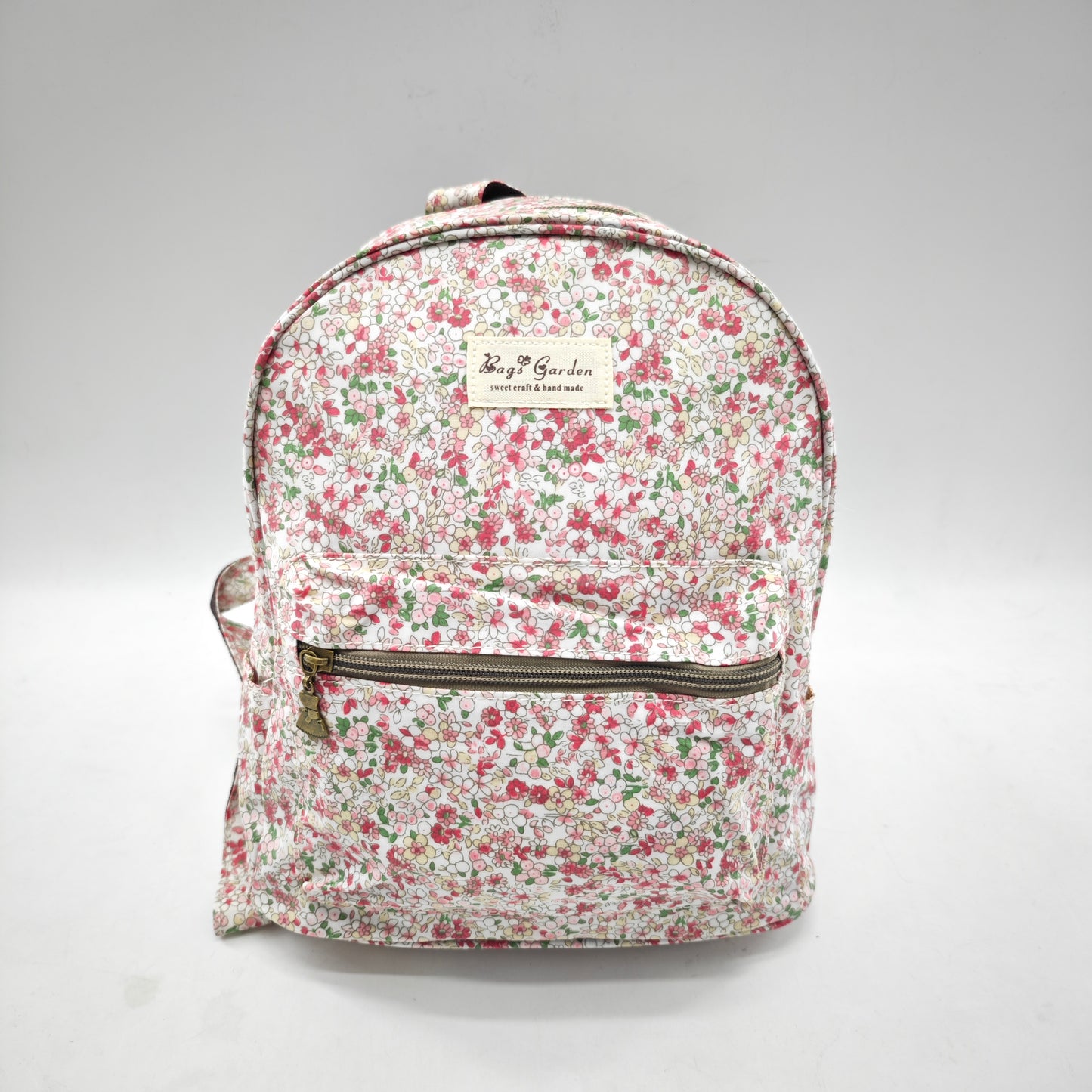 Mochila impermeable con flores – formato pequeño