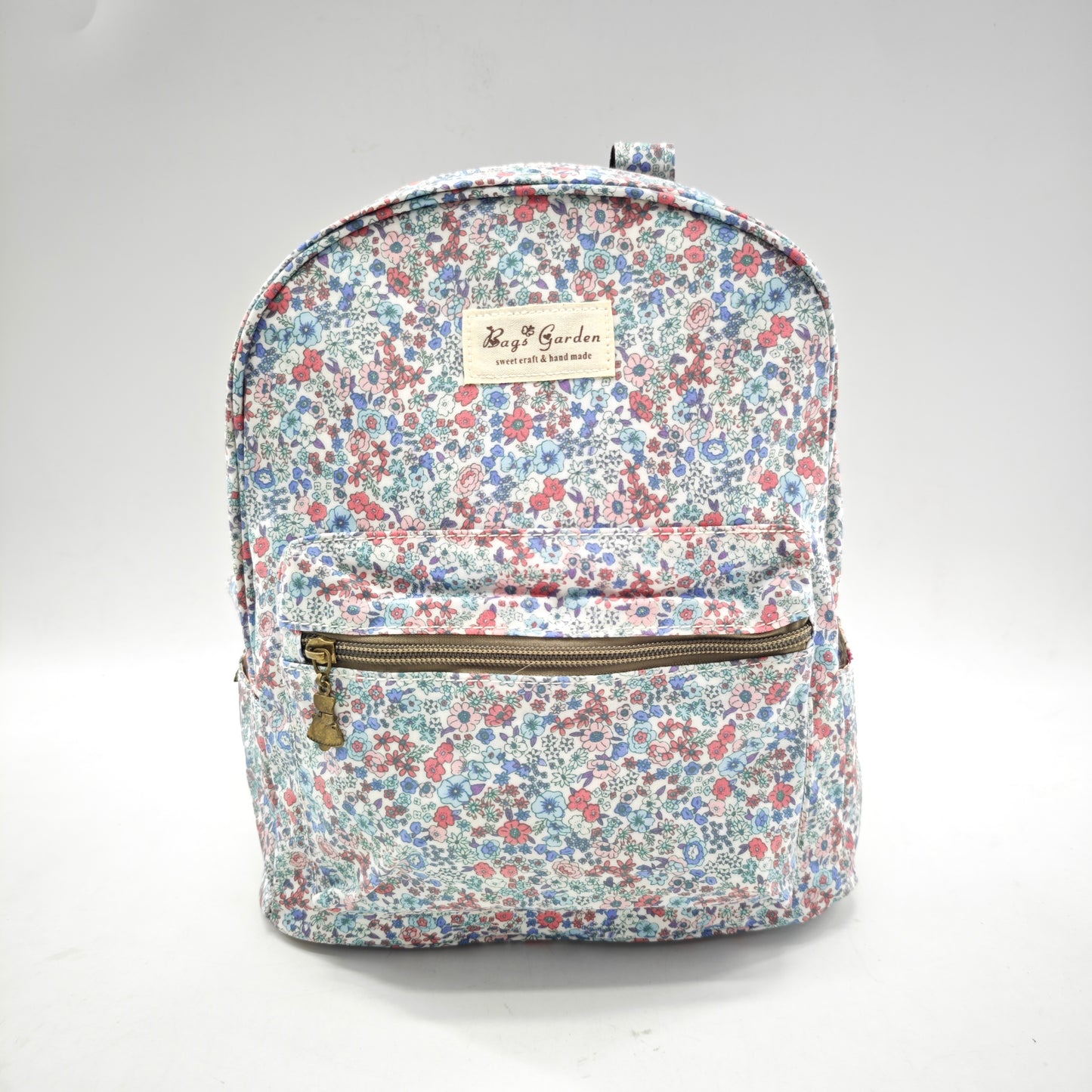 Mochila impermeable con flores – formato pequeño