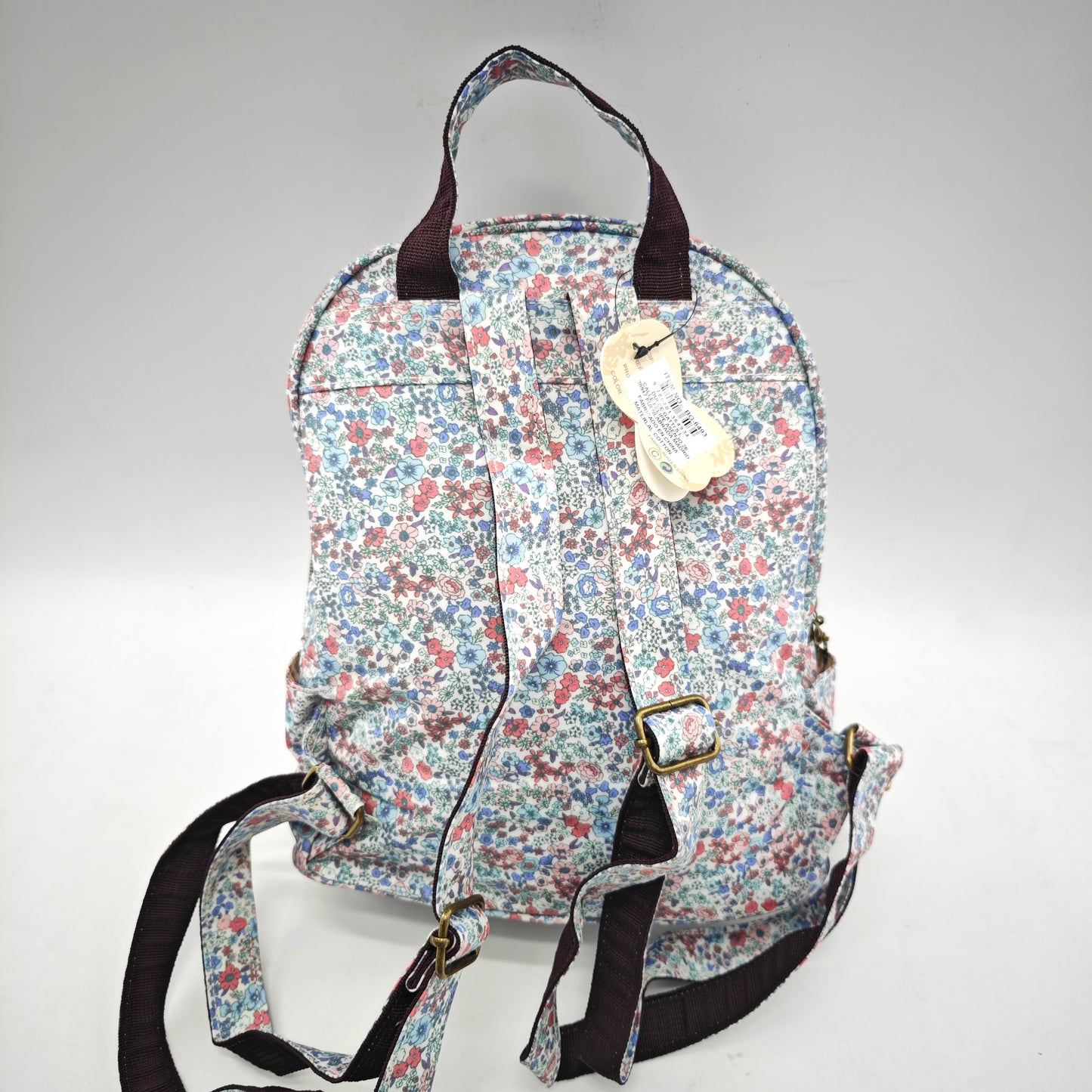 Mochila impermeable con flores – formato pequeño
