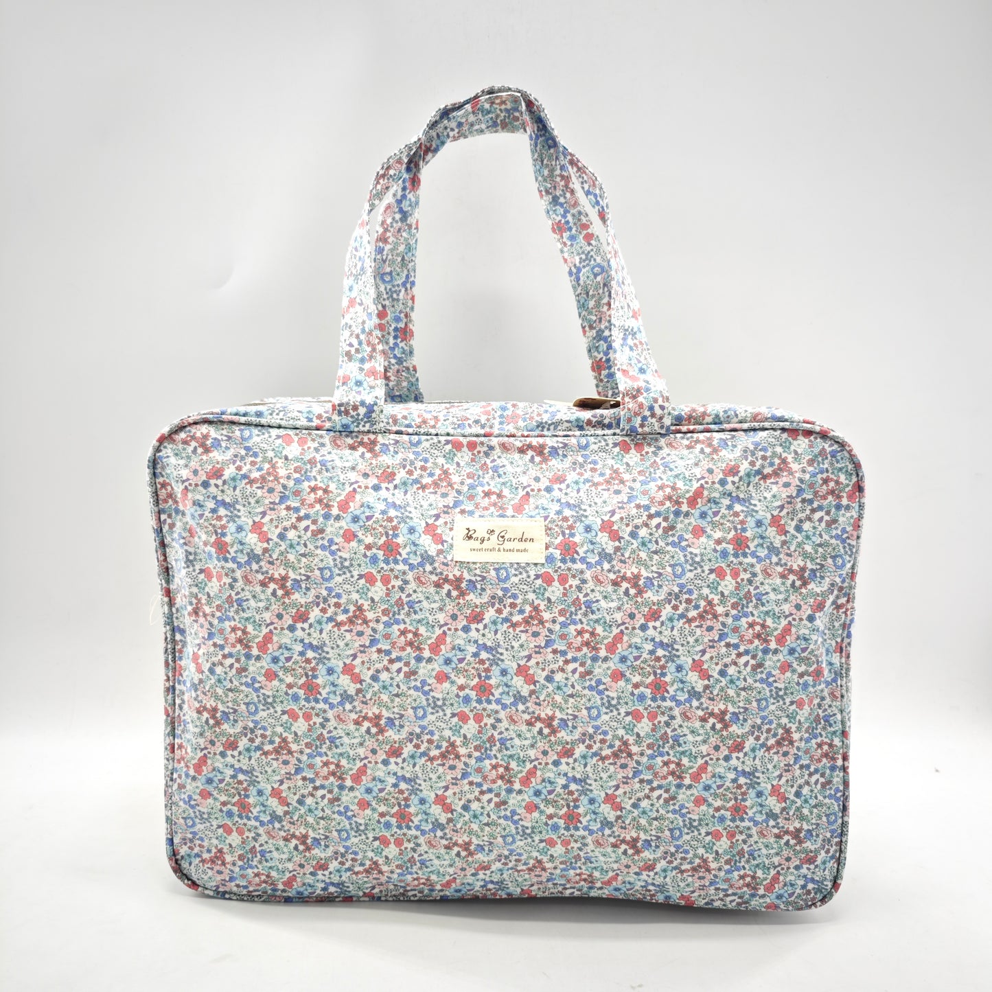 Maleta grande impermeable con flores
