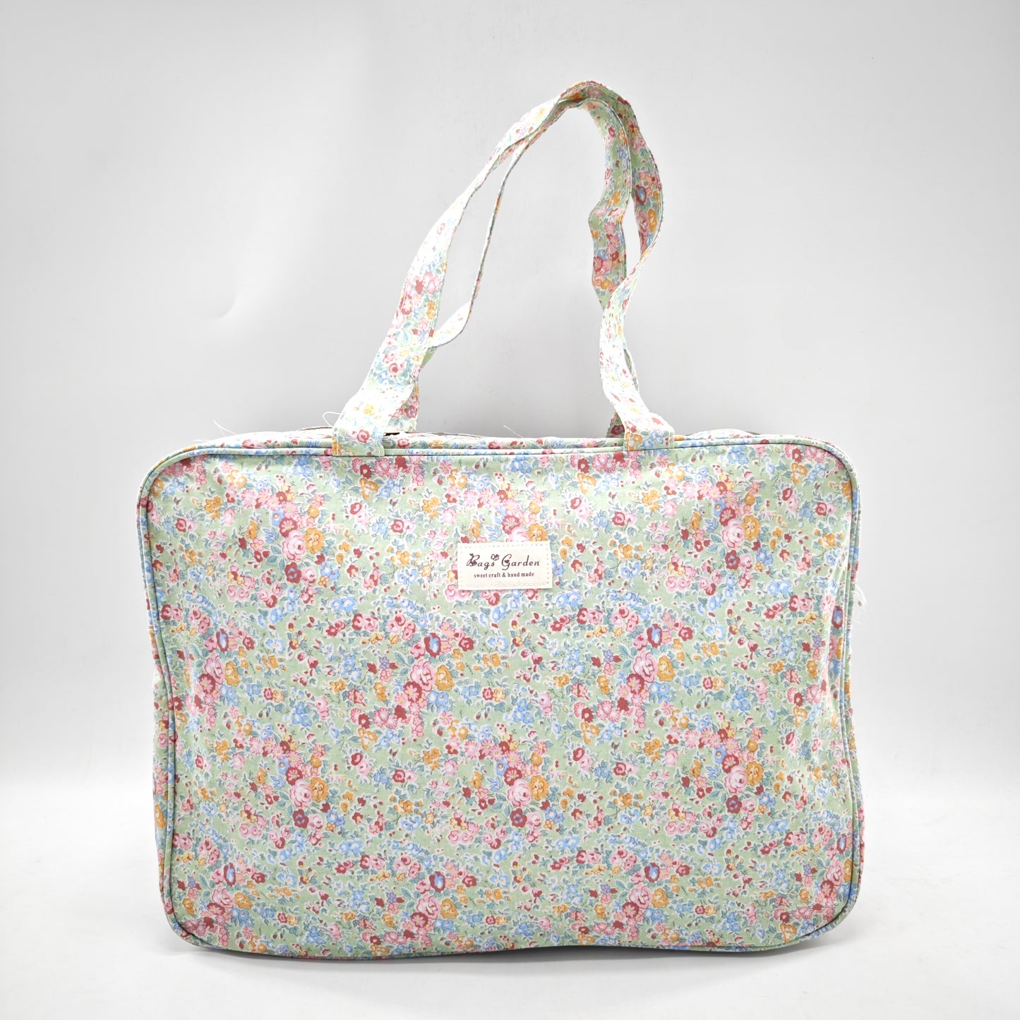 Maleta grande impermeable con flores