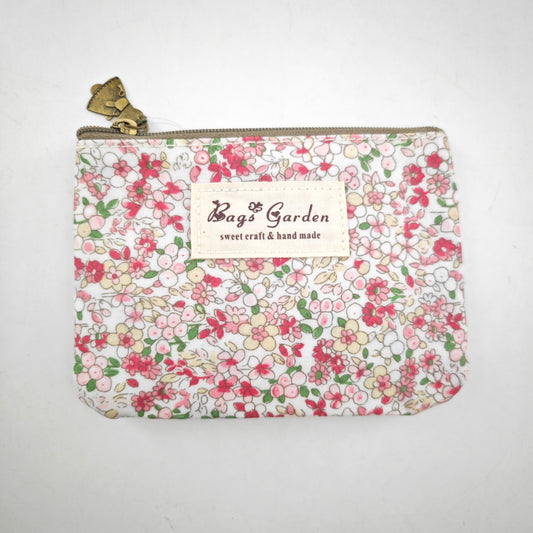 Monedero impermeable con flores