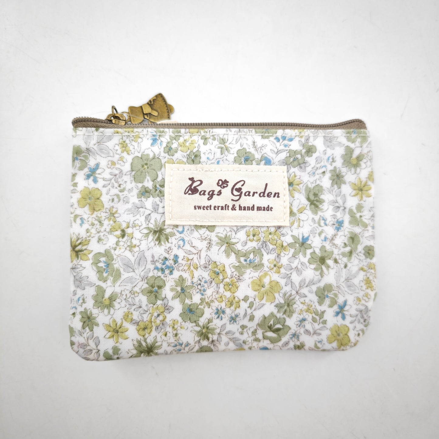 Monedero impermeable con flores