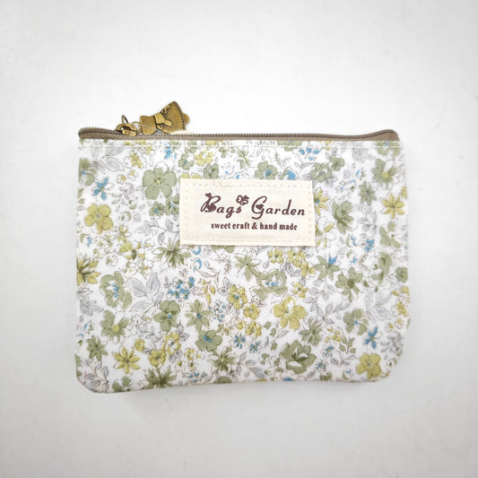Monedero impermeable con flores