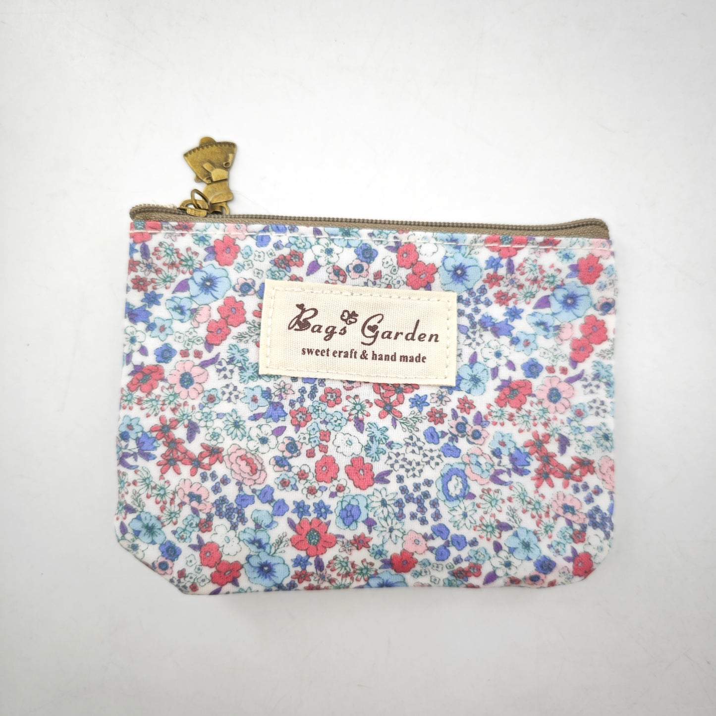 Monedero impermeable con flores