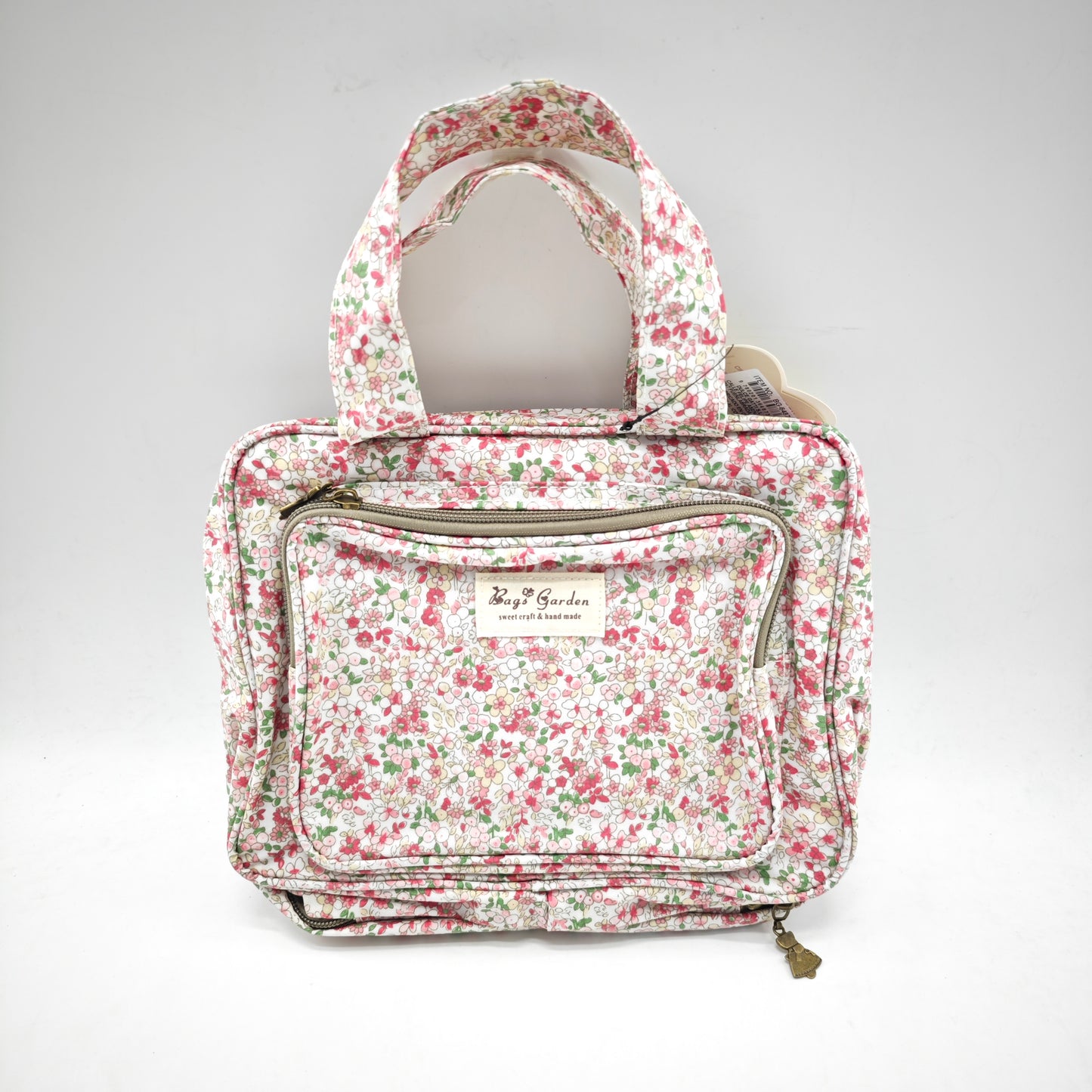 Neceser pequeño colgable impermeable de flores