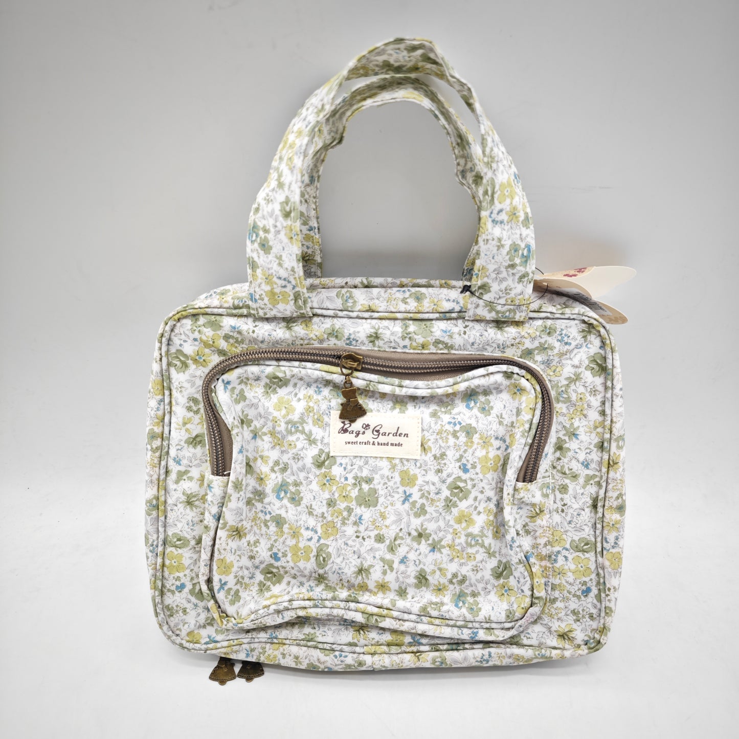 Neceser pequeño colgable impermeable de flores