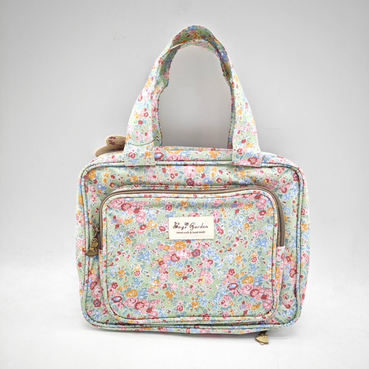 Neceser pequeño colgable impermeable de flores
