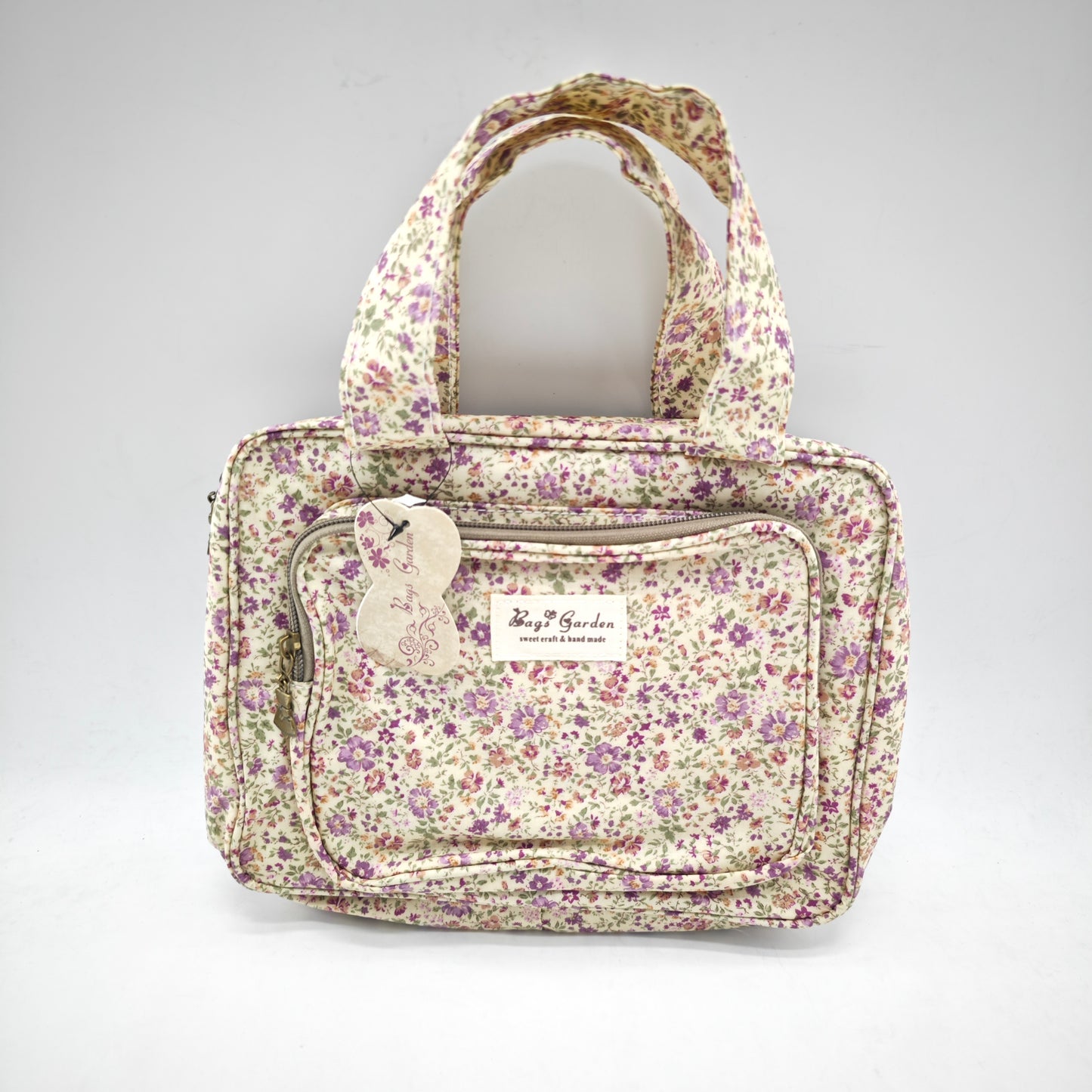 Neceser pequeño colgable impermeable de flores