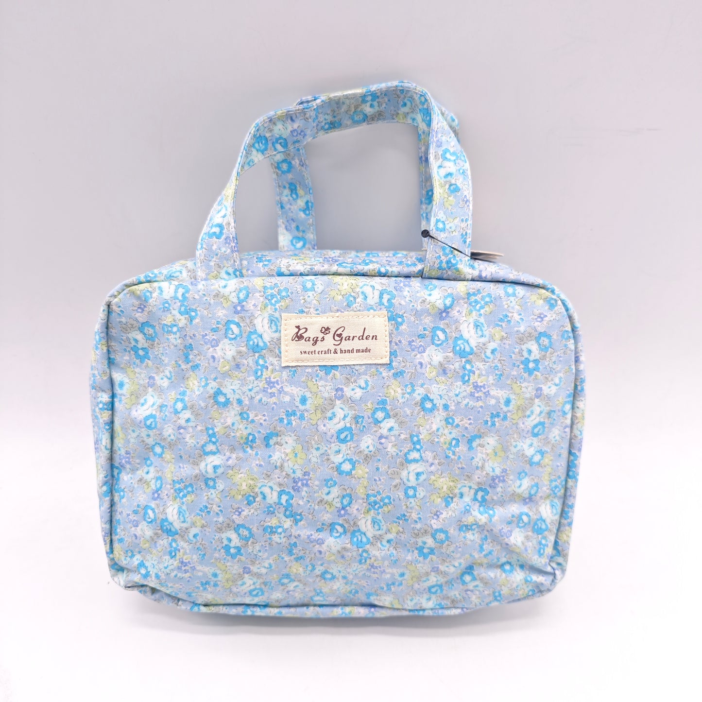 Neceser doble impermeable con estampado flora