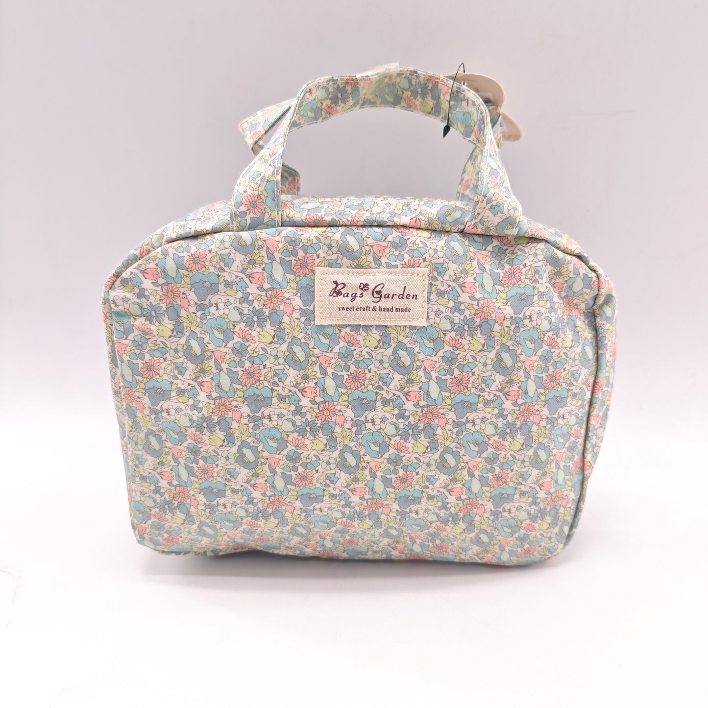 Neceser doble impermeable con estampado flora