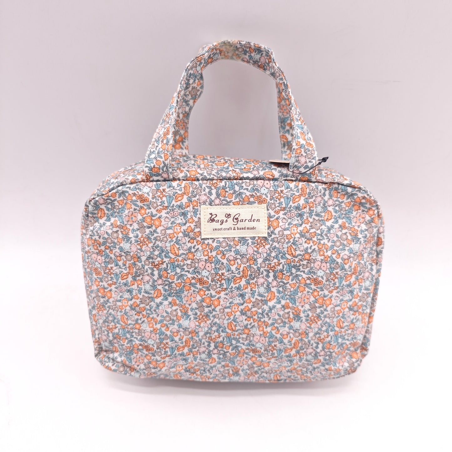 Neceser doble impermeable con estampado flora