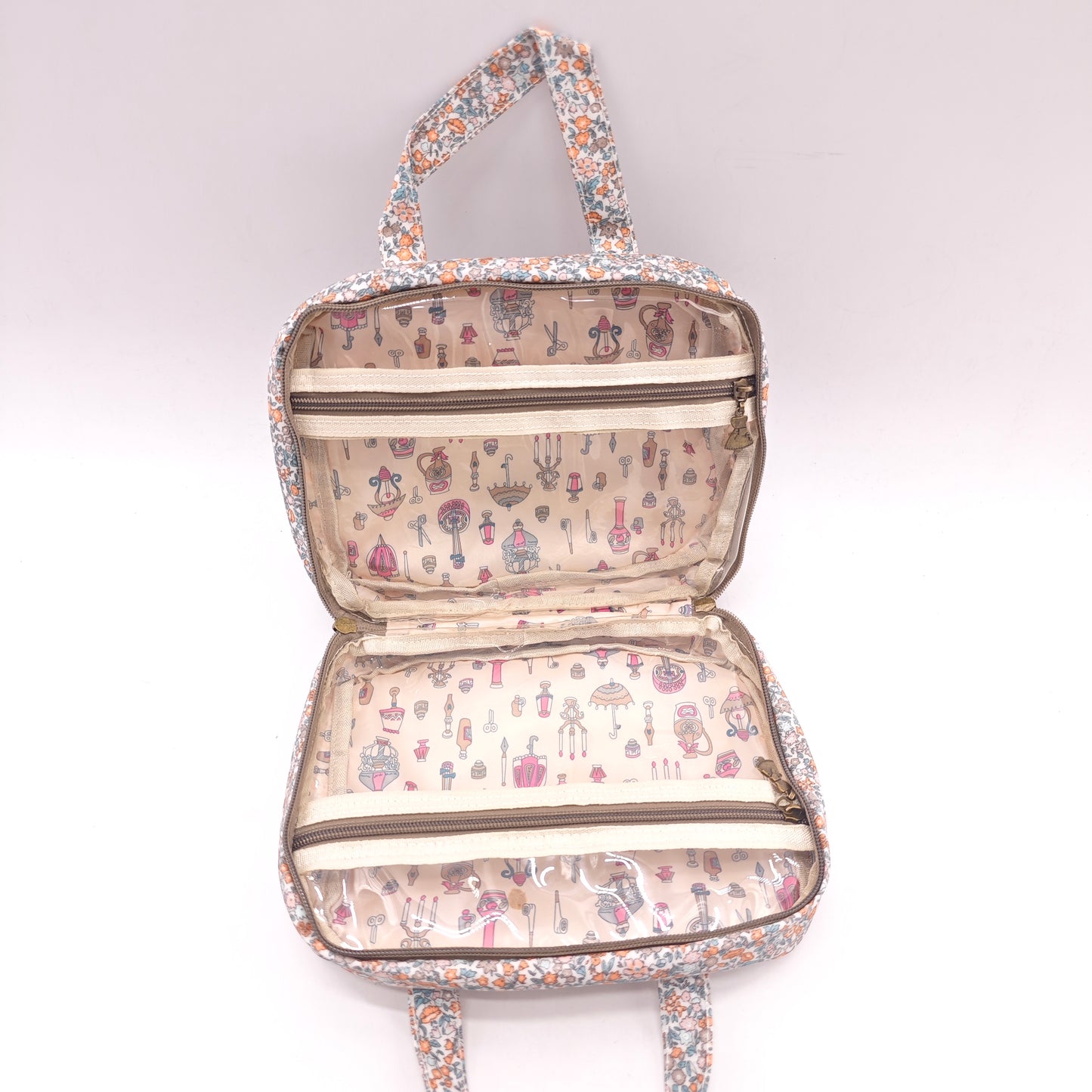 Neceser doble impermeable con estampado flora