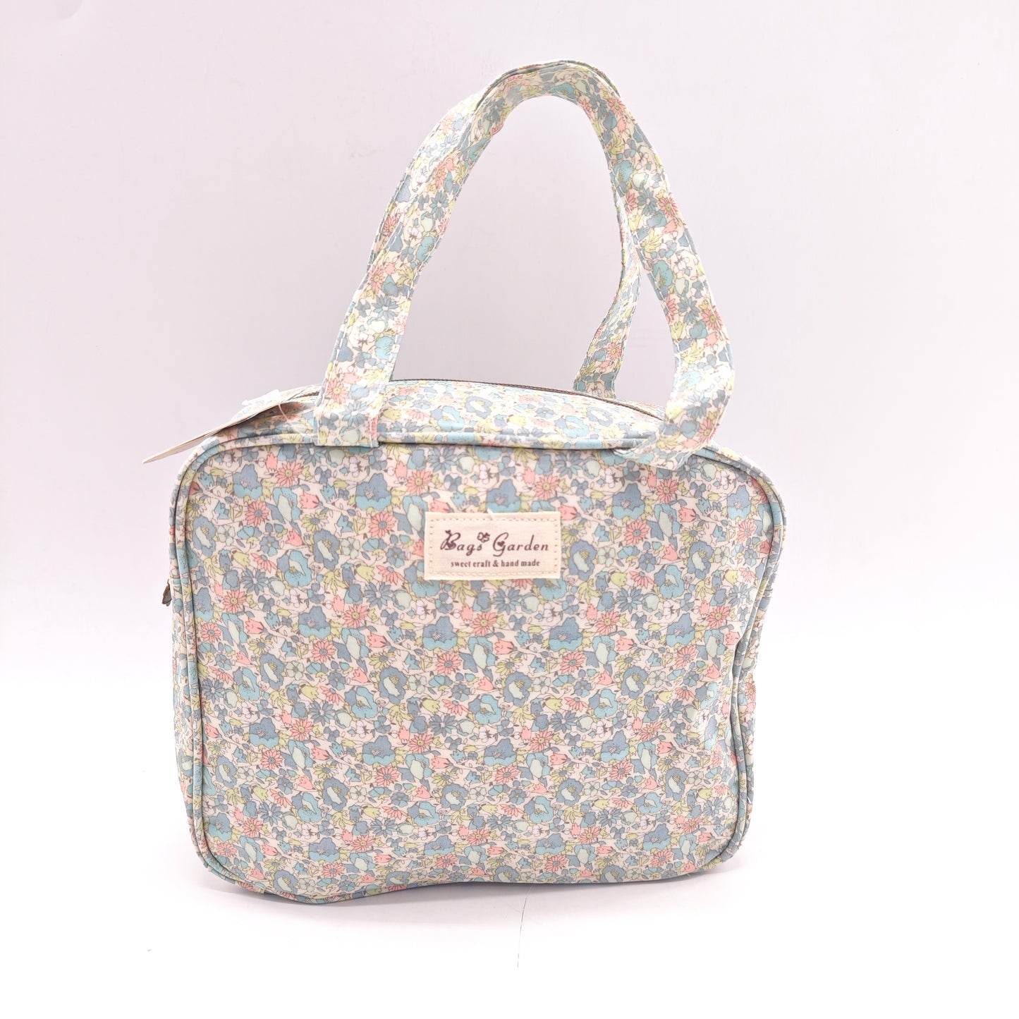 Bolso de mano impermeable con flores – formato cuadrado