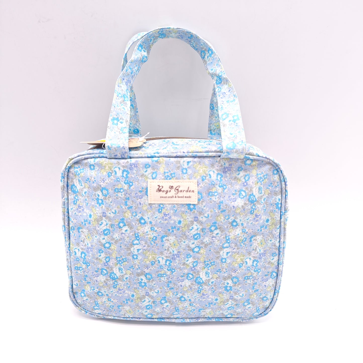 Bolso de mano impermeable con flores – formato cuadrado