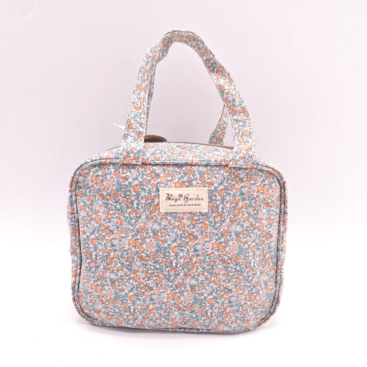 Bolso de mano impermeable con flores – formato cuadrado