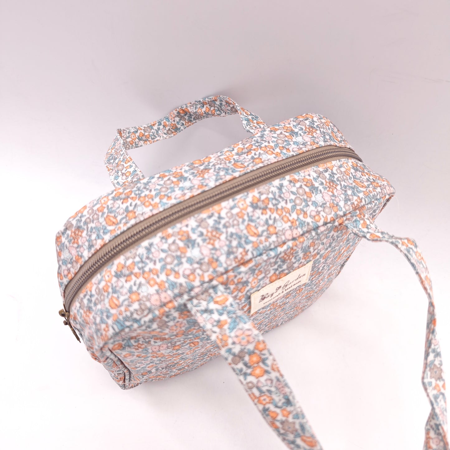Bolso de mano impermeable con flores – formato cuadrado