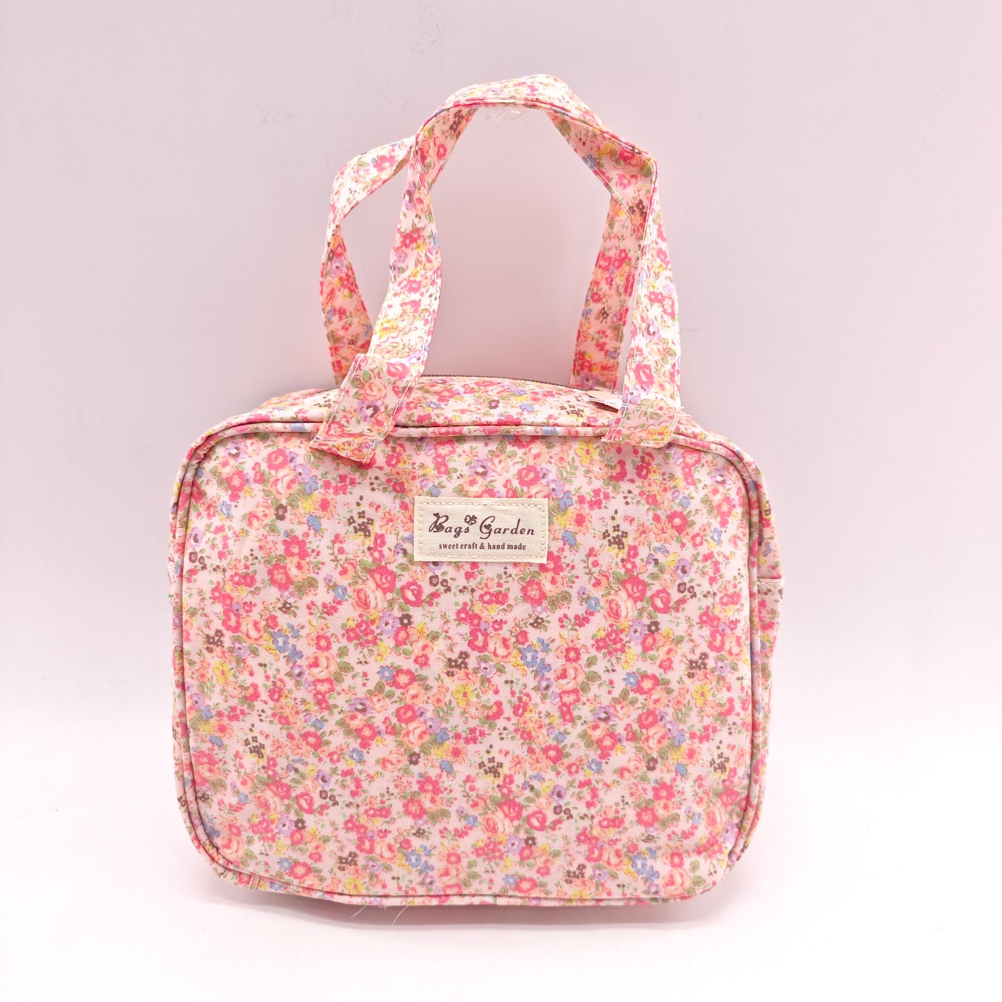 Bolso de mano impermeable con flores – formato cuadrado