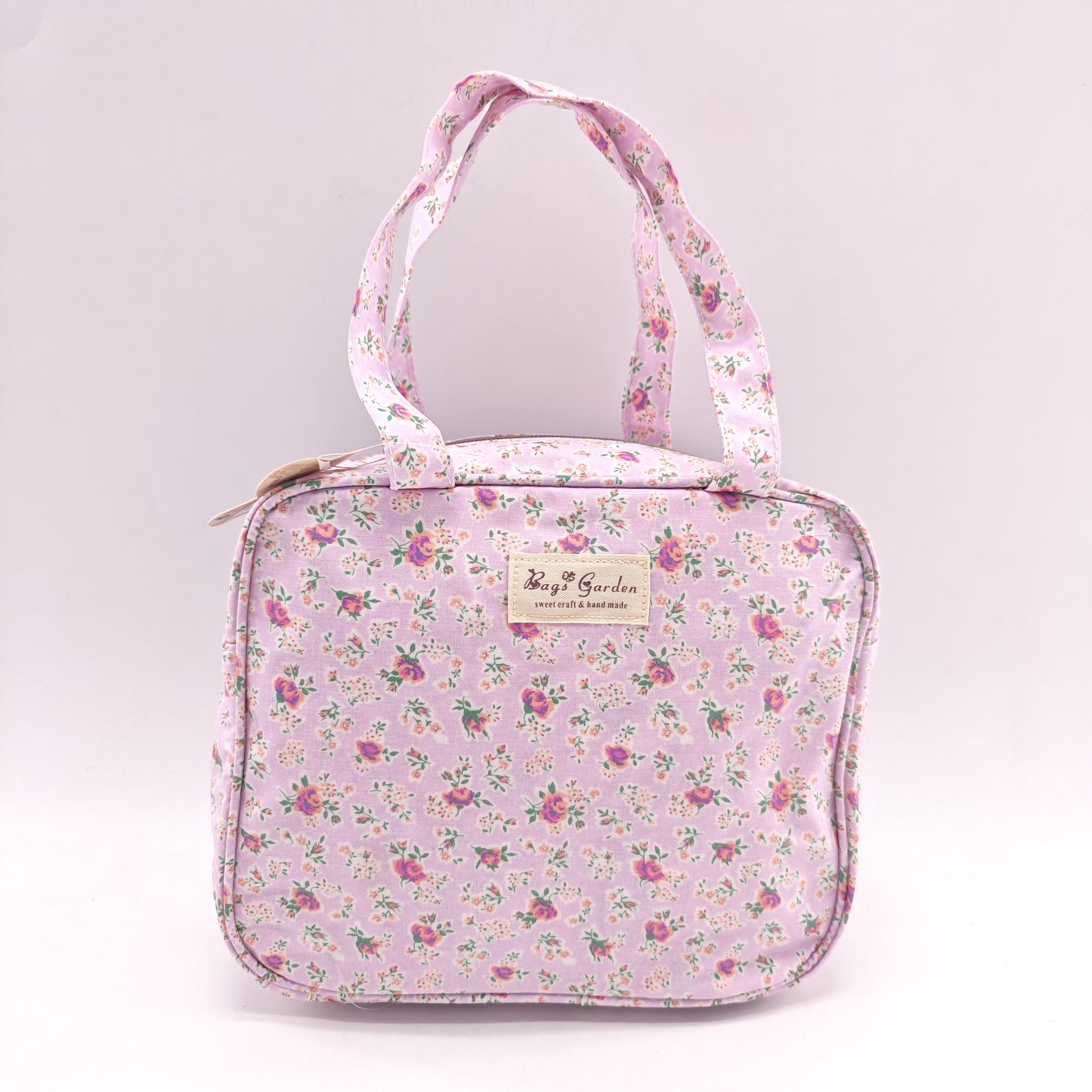 Bolso de mano impermeable con flores – formato cuadrado