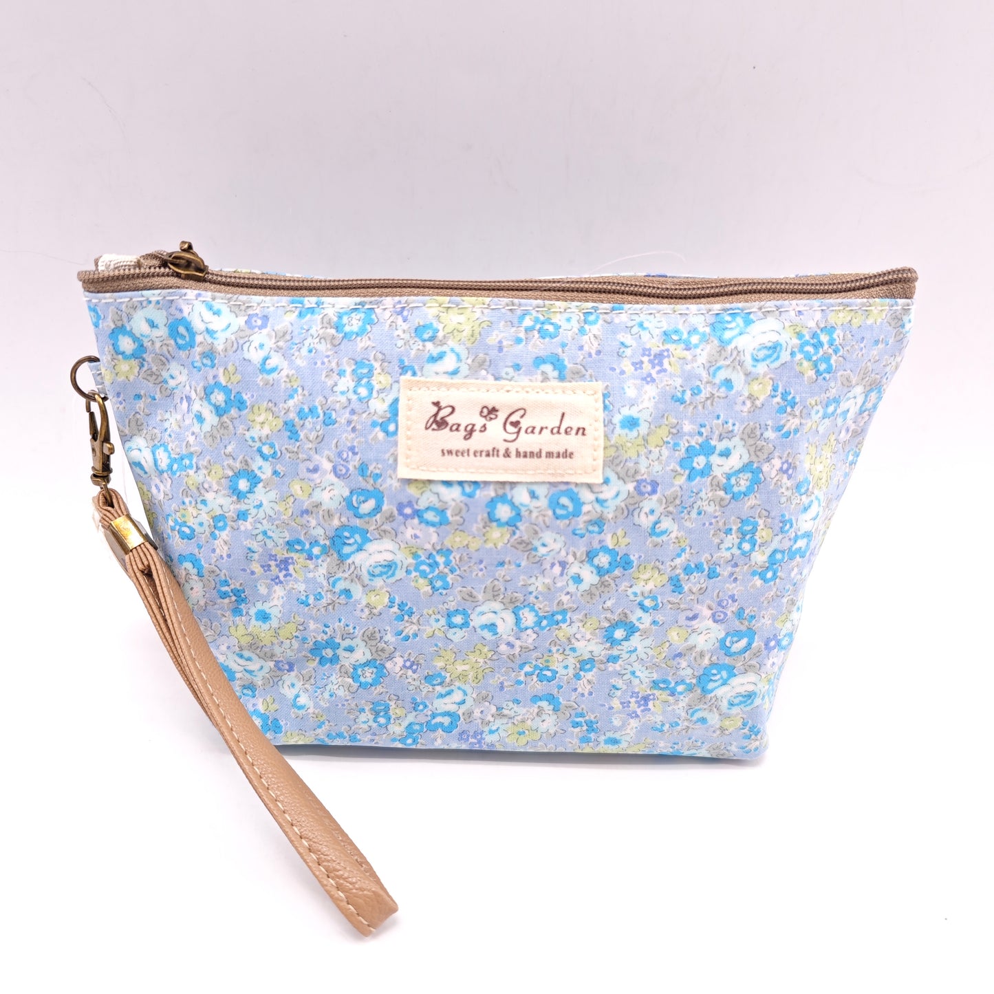 Neceser pequeño impermeable con flores