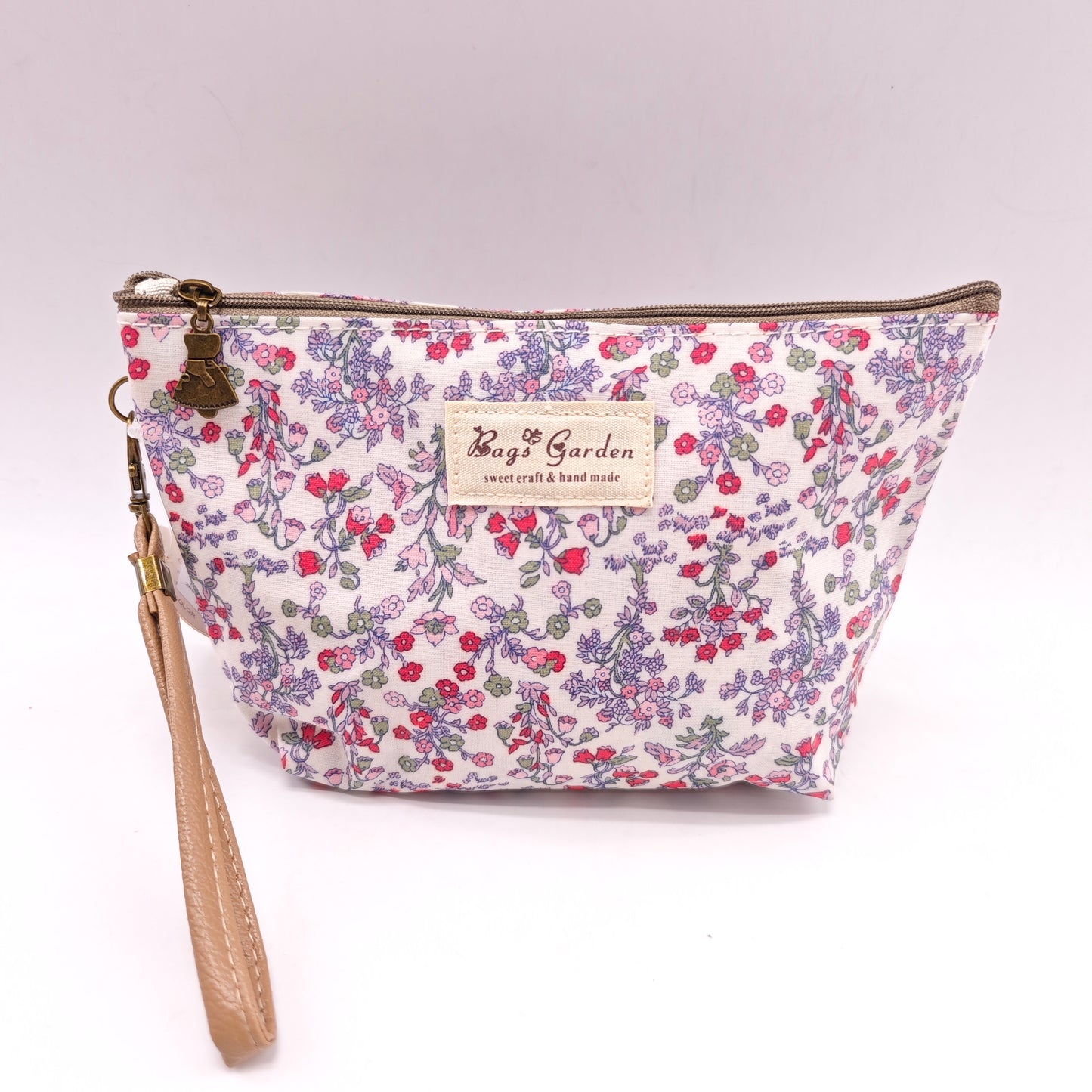 Neceser pequeño impermeable con flores