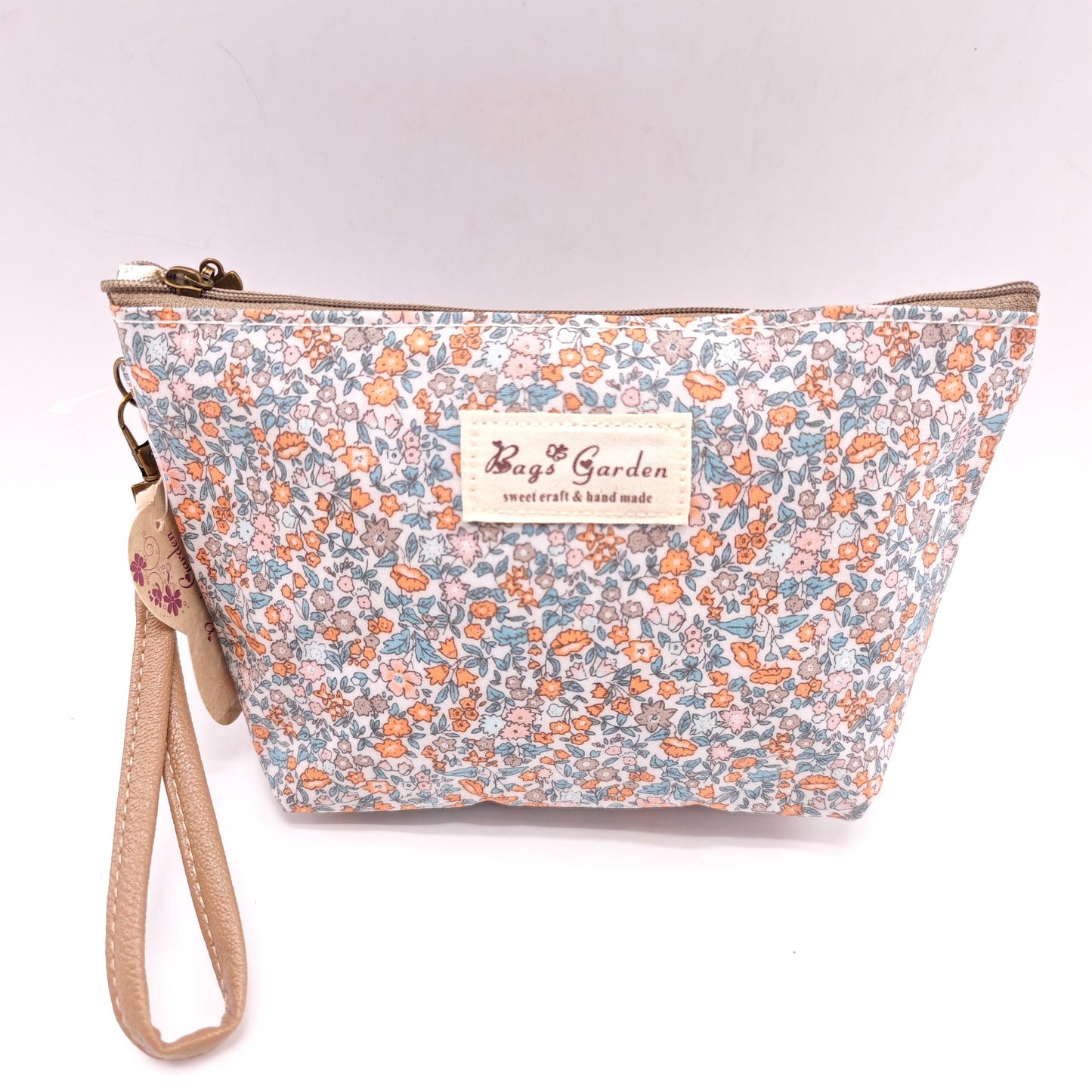 Neceser pequeño impermeable con flores