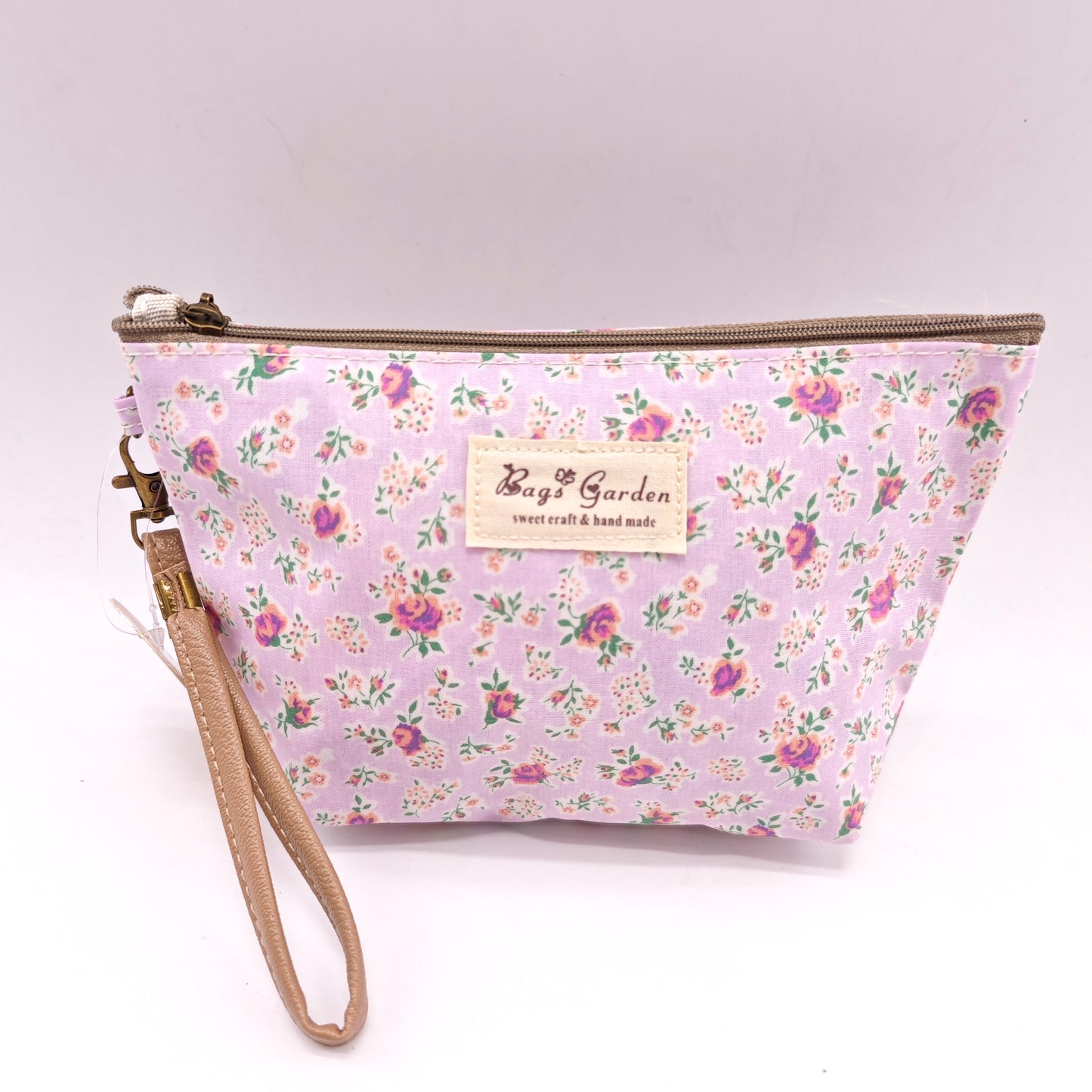 Neceser pequeño impermeable con flores