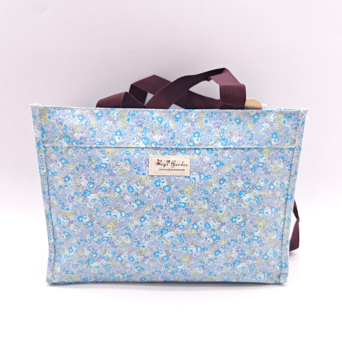 Bolso tote impermeable con estampado floral