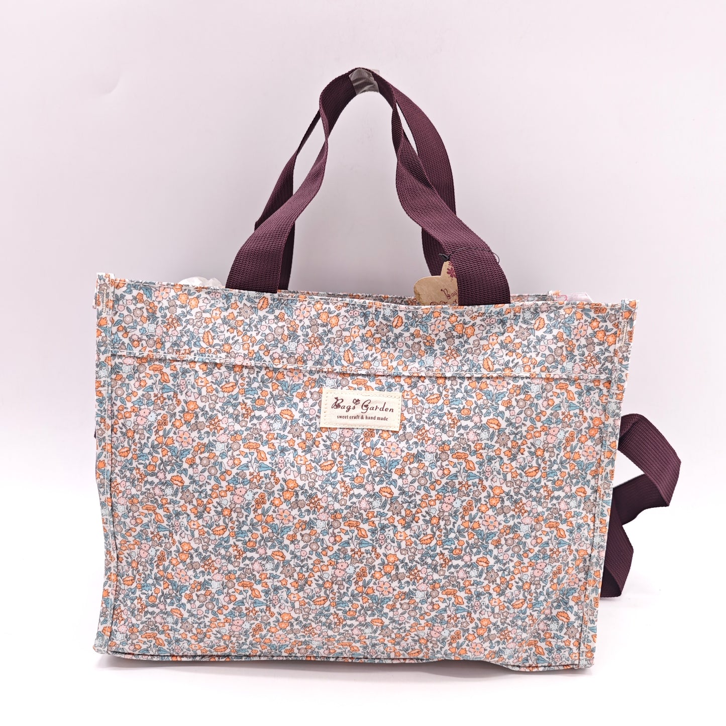 Bolso tote impermeable con estampado floral