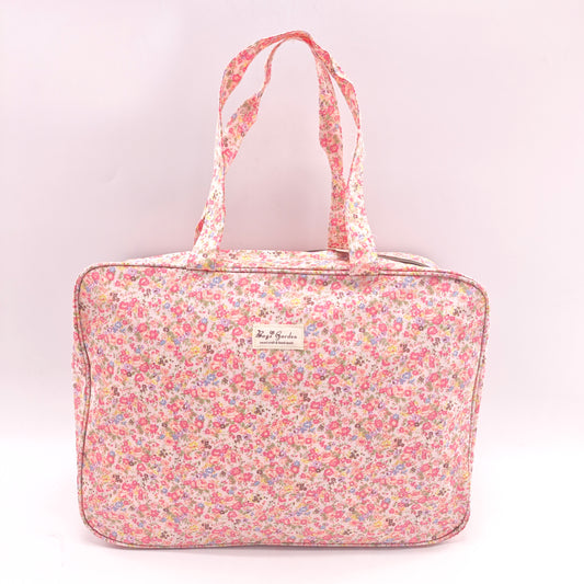 Maletita grande impermeable de flores