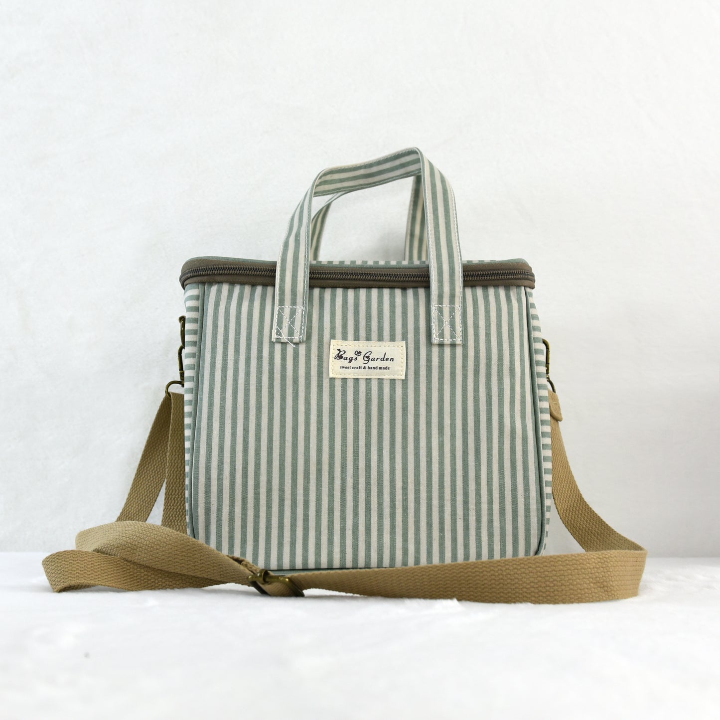 Bolsa nevera impermeable a rayas con asa y correa ajustable