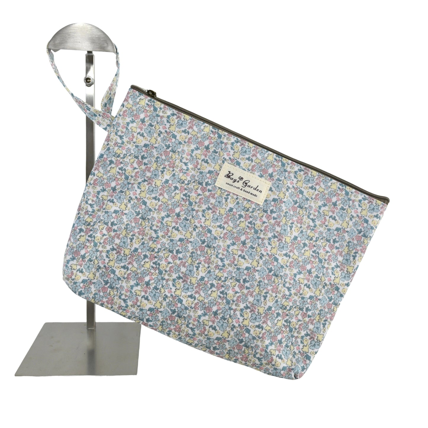 Neceser impermeable de flores grande con asa lateral fija